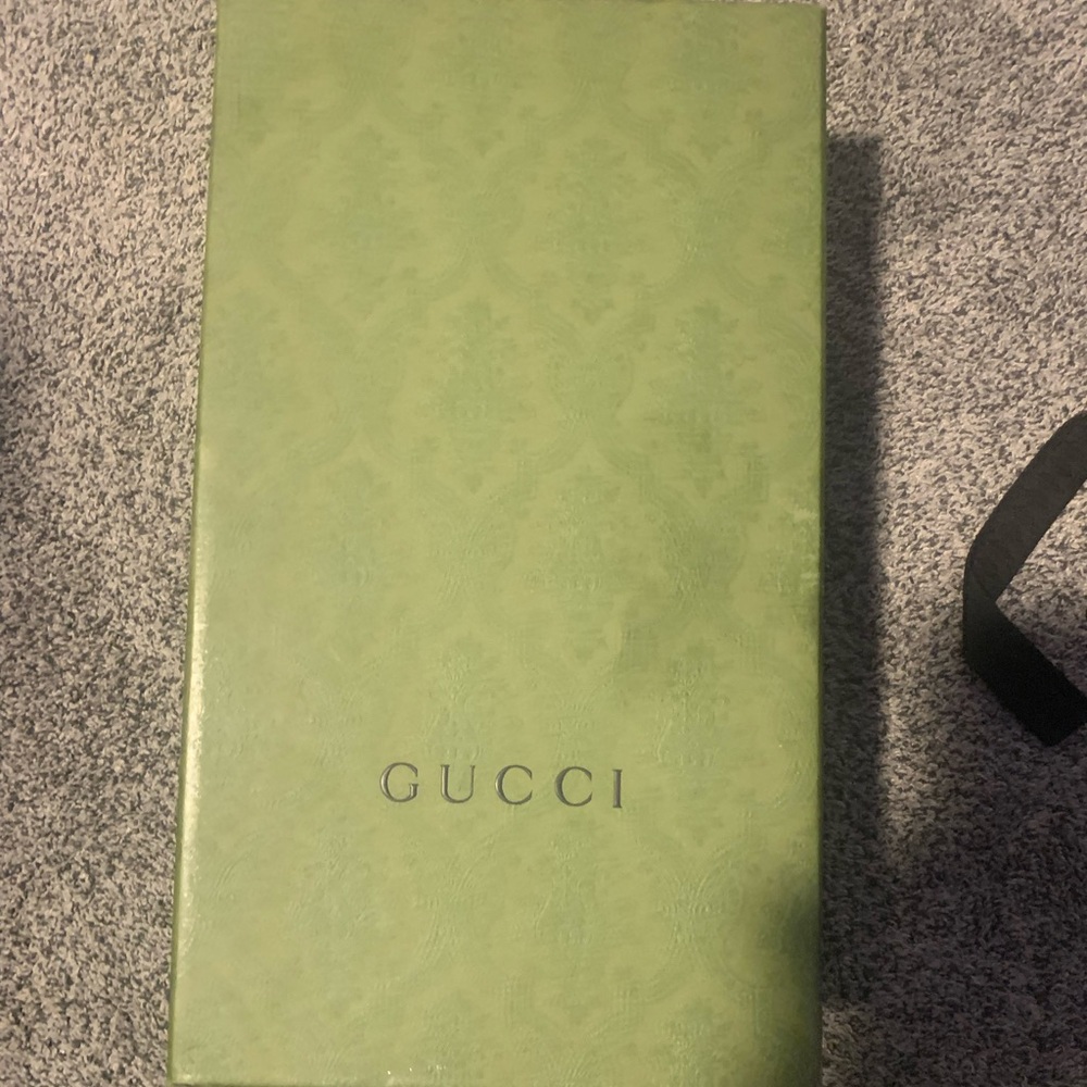 Gucci dress shoes (never worn) price is negotiable .